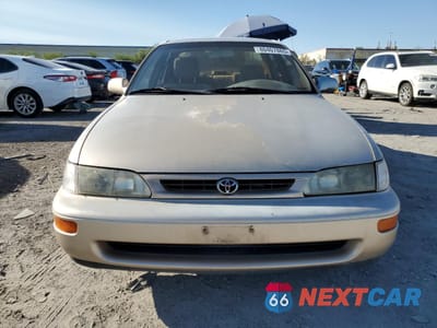 Piąte zdjęcie samochodu w środku: 1997 TOYOTA COROLLA DX VIN:1NXBB02E0VZ514759 - miniatura