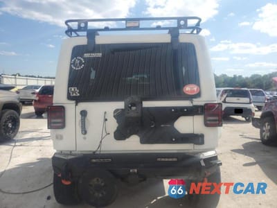 Zdjęcie 6 z 12 samochodu: 2016 JEEP WRANGLER UNLIMITED SAHARA VIN:1C4BJWEG2GL304390 - miniatura