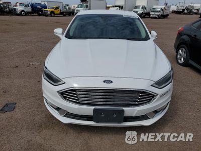 Piąte zdjęcie samochodu w środku: 2017 FORD FUSION SE HYBRID VIN:3FA6P0LU6HR409142 - miniatura