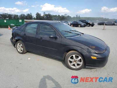 Czwarte zdjęcie samochodu z boku: 2003 FORD FOCUS ZTS VIN:1FAFP38ZX3W227441 - miniatura