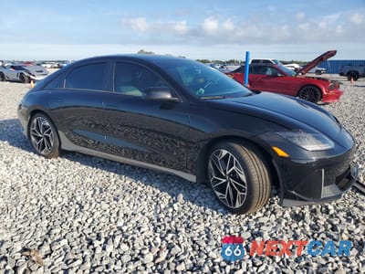 Czwarte zdjęcie samochodu z boku: 2023 HYUNDAI IONIQ 6 SEL VIN:KMHM34AA6PA046147 - miniatura