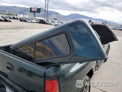 Zdjęcie 12 z 13 samochodu: 2004 GMC SIERRA K1500 DENALI VIN:2GTFK69U341115005 - miniatura