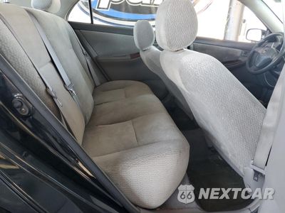Zdjęcie 10 z 14 samochodu: 2003 TOYOTA COROLLA CE VIN:JTDBR32E030036736 - miniatura