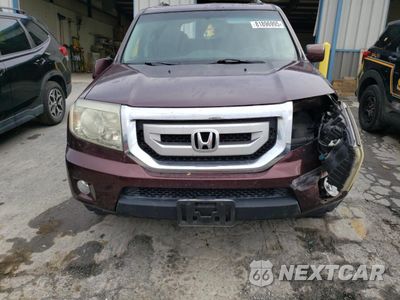 Piąte zdjęcie samochodu w środku: 2011 HONDA PILOT EXLN VIN:5FNYF4H77BB059609 - miniatura