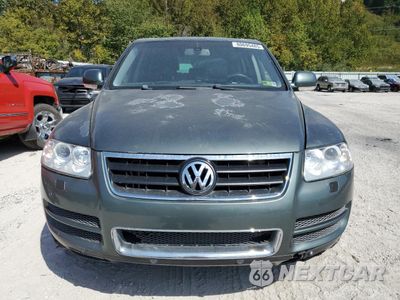 Piąte zdjęcie samochodu w środku: 2004 VOLKSWAGEN TOUAREG 4.2 VIN:WVGEM77L84D046978 - miniatura