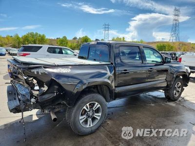 Trzecie zdjęcie samochodu z tyłu: 2017 TOYOTA TACOMA TRD SPORT VIN:3TMCZ5AN6HM089138 - miniatura