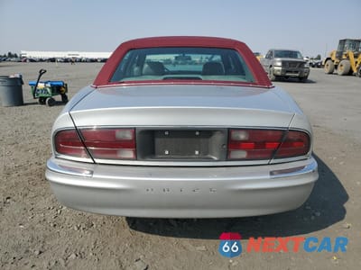Zdjęcie 6 z 14 samochodu: 2001 BUICK PARK AVENUE VIN:1G4CW54KX14234897 - miniatura