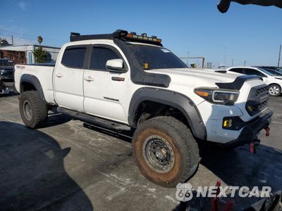 Czwarte zdjęcie samochodu z boku: 2021 TOYOTA TACOMA DOUBLE CAB VIN:3TMDZ5BN9MM106091 - miniatura