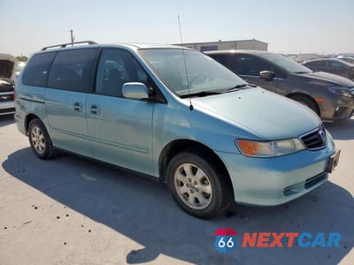 Czwarte zdjęcie samochodu z boku: 2003 HONDA ODYSSEY EXL VIN:5FNRL189X3B151991 - miniatura