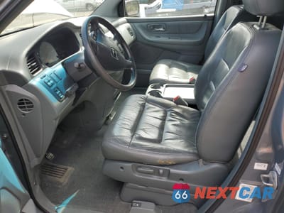 Zdjęcie 7 z 15 samochodu: 2002 HONDA ODYSSEY EXL VIN:2HKRL18092H511642 - miniatura