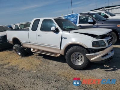 Czwarte zdjęcie samochodu z boku: 1997 FORD F150 VIN:1FTDX1867VKA78024 - miniatura