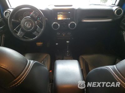 Zdjęcie 8 z 12 samochodu: 2015 JEEP WRANGLER UNLIMITED SAHARA VIN:1C4BJWEG4FL565177 - miniatura