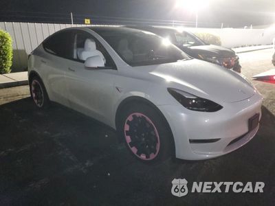 Czwarte zdjęcie samochodu z boku: 2024 TESLA MODEL Y VIN:7SAYGAEE4RF074337 - miniatura