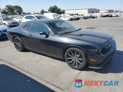 Czwarte zdjęcie samochodu z boku: 2010 DODGE CHALLENGER SE VIN:2B3CJ4DV1AH260414 - miniatura