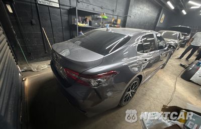 Czwarte zdjęcie samochodu z boku: 2024 TOYOTA CAMRY SE NIGHT SHADE VIN:4T1G11AK4RU899030 - miniatura