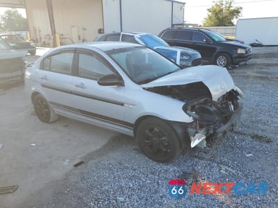 Czwarte zdjęcie samochodu z boku: 2007 HYUNDAI ACCENT GLS VIN:KMHCN46C57U143211 - miniatura