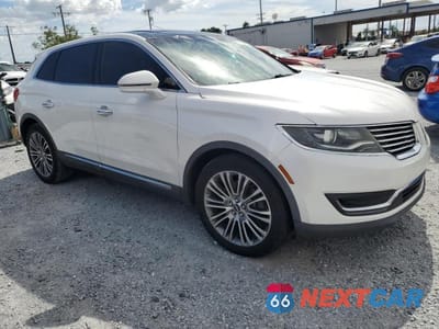 Czwarte zdjęcie samochodu z boku: 2016 LINCOLN MKX RESERVE VIN:2LMTJ6LR9GBL75904 - miniatura