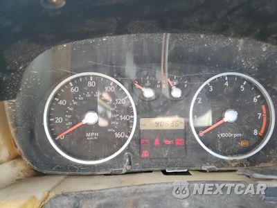 Zdjęcie 9 z 12 samochodu: 2005 HYUNDAI TIBURON VIN:KMHHN65F25U168299 - miniatura