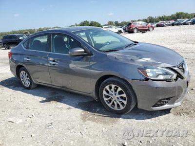 Czwarte zdjęcie samochodu z boku: 2018 NISSAN SENTRA S VIN:3N1AB7AP3JY274452 - miniatura