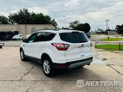 Trzecie zdjęcie samochodu z tyłu: 2018 FORD ESCAPE SE VIN:1FMCU0GD6JUB26315 - miniatura