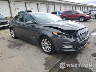 Czwarte zdjęcie samochodu z boku: 2017 FORD FUSION SE HYBRID VIN:3FA6P0LU8HR120814 - miniatura