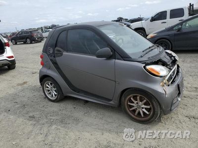 Czwarte zdjęcie samochodu z boku: 2015 SMART FORTWO VIN:WMEEJ9AA0FK834850 - miniatura