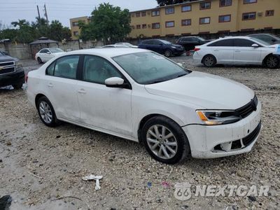 Czwarte zdjęcie samochodu z boku: 2012 VOLKSWAGEN JETTA SE VIN:3VWDP7AJXCM344205 - miniatura