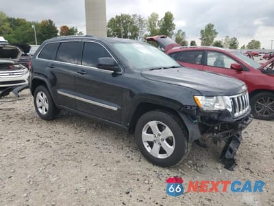 Czwarte zdjęcie samochodu z boku: 2011 JEEP GRAND CHEROKEE LAREDO VIN:1J4RR4GG6BC542397 - miniatura