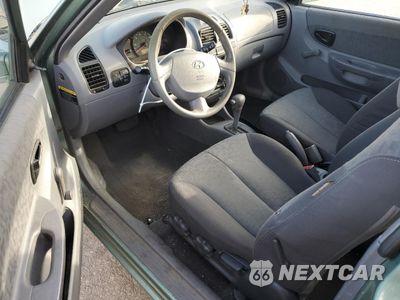 Zdjęcie 8 z 14 samochodu: 2004 HYUNDAI ACCENT GL VIN:KMHCG35C14U308396 - miniatura