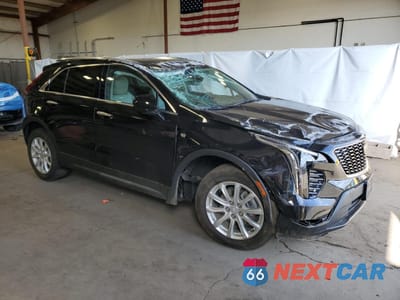Czwarte zdjęcie samochodu z boku: 2023 CADILLAC XT4 LUXURY VIN:1GYFZBR4XPF221365 - miniatura