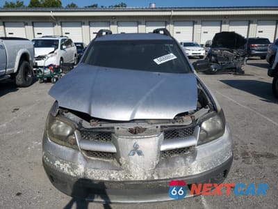 Piąte zdjęcie samochodu w środku: 2003 MITSUBISHI OUTLANDER LS VIN:JA4LZ31G13U046007 - miniatura