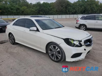Czwarte zdjęcie samochodu z boku: 2014 MERCEDES-BENZ E 350 VIN:WDDHF5KB3EA805611 - miniatura