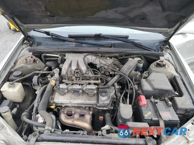 Zdjęcie 11 z 14 samochodu: 2000 TOYOTA AVALON VIN:4T1BF28B3YU089796 - miniatura