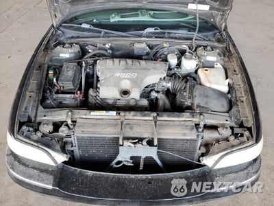 Zdjęcie 11 z 13 samochodu: 2001 BUICK PARK AVENUE VIN:1G4CW54K614278007 - miniatura
