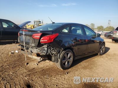 Trzecie zdjęcie samochodu z tyłu: 2017 FORD FOCUS SE VIN:1FADP3FE0HL284361 - miniatura