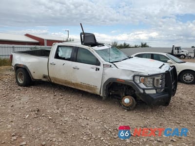 Czwarte zdjęcie samochodu z boku: 2023 GMC SIERRA K3500 DENALI VIN:1GT49WEY1PF212714 - miniatura