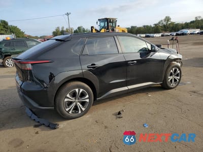 Trzecie zdjęcie samochodu z tyłu: 2023 TOYOTA BZ4X XLE VIN:JTMABACA8PA026438 - miniatura