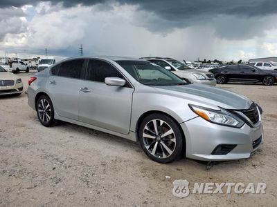 Czwarte zdjęcie samochodu z boku: 2016 NISSAN ALTIMA 2.5 VIN:1N4AL3AP5GC188070 - miniatura
