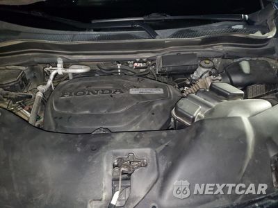Zdjęcie 12 z 13 samochodu: 2019 HONDA PILOT TOURING VIN:5FNYF5H67KB043293 - miniatura