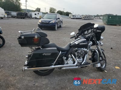 2011 HARLEY-DAVIDSON FLHTK 1HD1KEM10BB622246 - główne zdjęcie licytacji z USA - miniatura