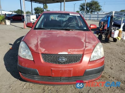 Piąte zdjęcie samochodu w środku: 2006 KIA RIO VIN:KNADE123566088501 - miniatura