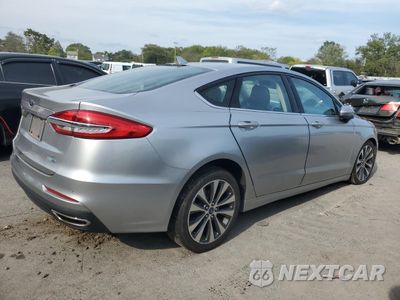 Trzecie zdjęcie samochodu z tyłu: 2020 FORD FUSION SE VIN:3FA6P0T94LR218789 - miniatura