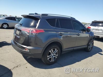 Trzecie zdjęcie samochodu z tyłu: 2018 TOYOTA RAV4 LE VIN:JTMZFREV7JJ212887 - miniatura