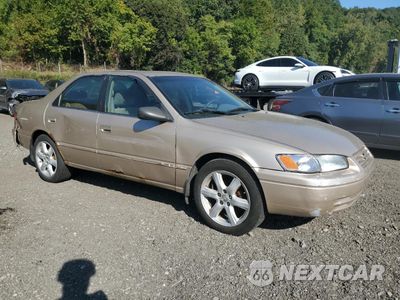 Czwarte zdjęcie samochodu z boku: 1999 TOYOTA CAMRY LE VIN:JT2BG22K2X0277444 - miniatura