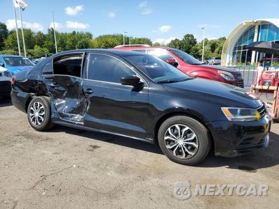 Czwarte zdjęcie samochodu z boku: 2016 VOLKSWAGEN JETTA S VIN:3VW267AJ0GM328949 - miniatura