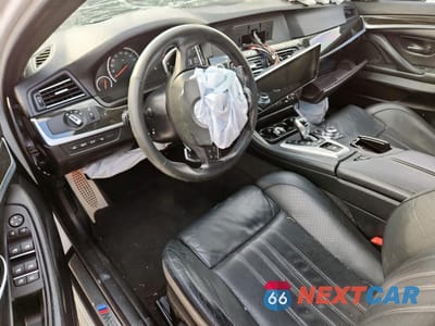 Zdjęcie 8 z 13 samochodu: 2013 BMW M5 VIN:WBSFV9C5XDD095469 - miniatura