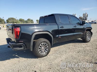 Trzecie zdjęcie samochodu z tyłu: 2022 GMC SIERRA K1500 AT4 VIN:1GTUUEET3NZ601038 - miniatura