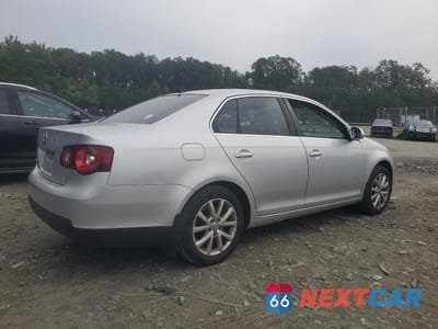 Trzecie zdjęcie samochodu z tyłu: 2010 VOLKSWAGEN JETTA SE VIN:3VWRZ7AJ4AM045418 - miniatura