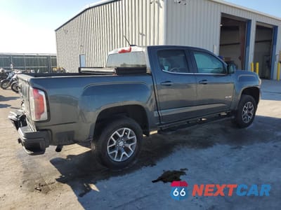 Trzecie zdjęcie samochodu z tyłu: 2015 GMC CANYON SLE VIN:1GTG6BE36F1273197 - miniatura