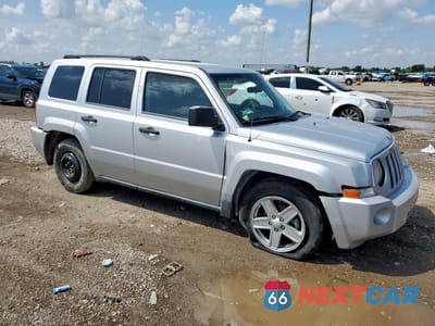 Czwarte zdjęcie samochodu z boku: 2009 JEEP PATRIOT SPORT VIN:1J4FT28B99D102657 - miniatura